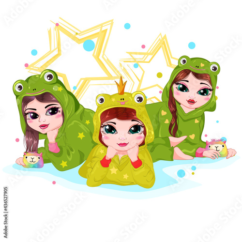 Children's pajama party in frog costumes. Smiling girlfriends in kigurumi jumpsuits lie on the floor. Three teenage girls having fun playing with toys