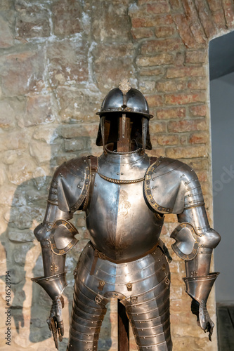 Gallery of knight's armor. Knight's iron armor in the museum. toned