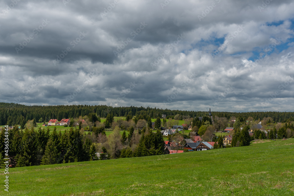 Prebuz village with fresh meadows and forests in spring day Prebuz village with fresh meadows and forests in spring day