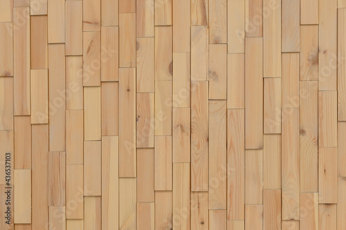Wooden tile wall made from pieces of wood scrap texture background