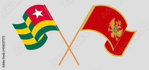 Crossed and waving flags of Togo and Montenegro