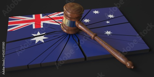 Judge's gavel and broken block with flag of Australia. Conceptual 3d rendering
