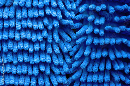 Close up image of new blue microfiber mop pad