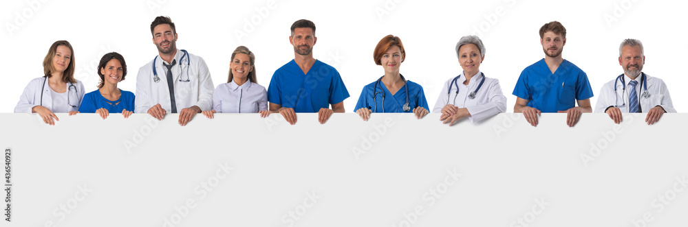 Group of doctors with blank banner