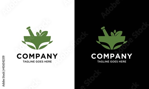 Mortar and pestle vector design represents herbal medicine, pharmacy logo, signs and symbols