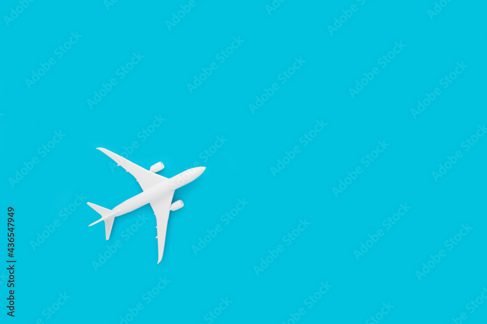 Airplane toy isolated on pastel blue background