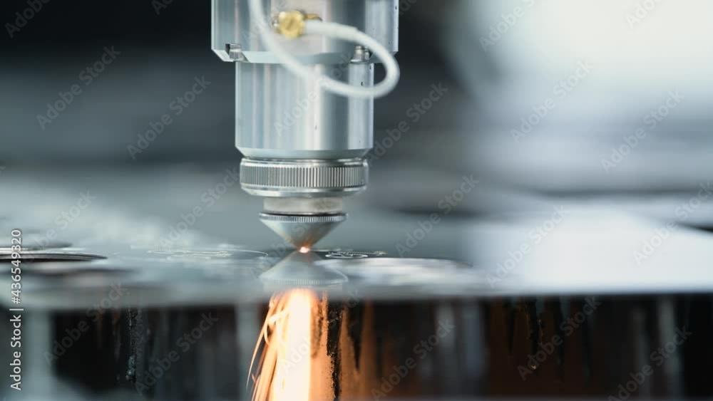 laser cutting. Metal machining with sparks on CNC machine