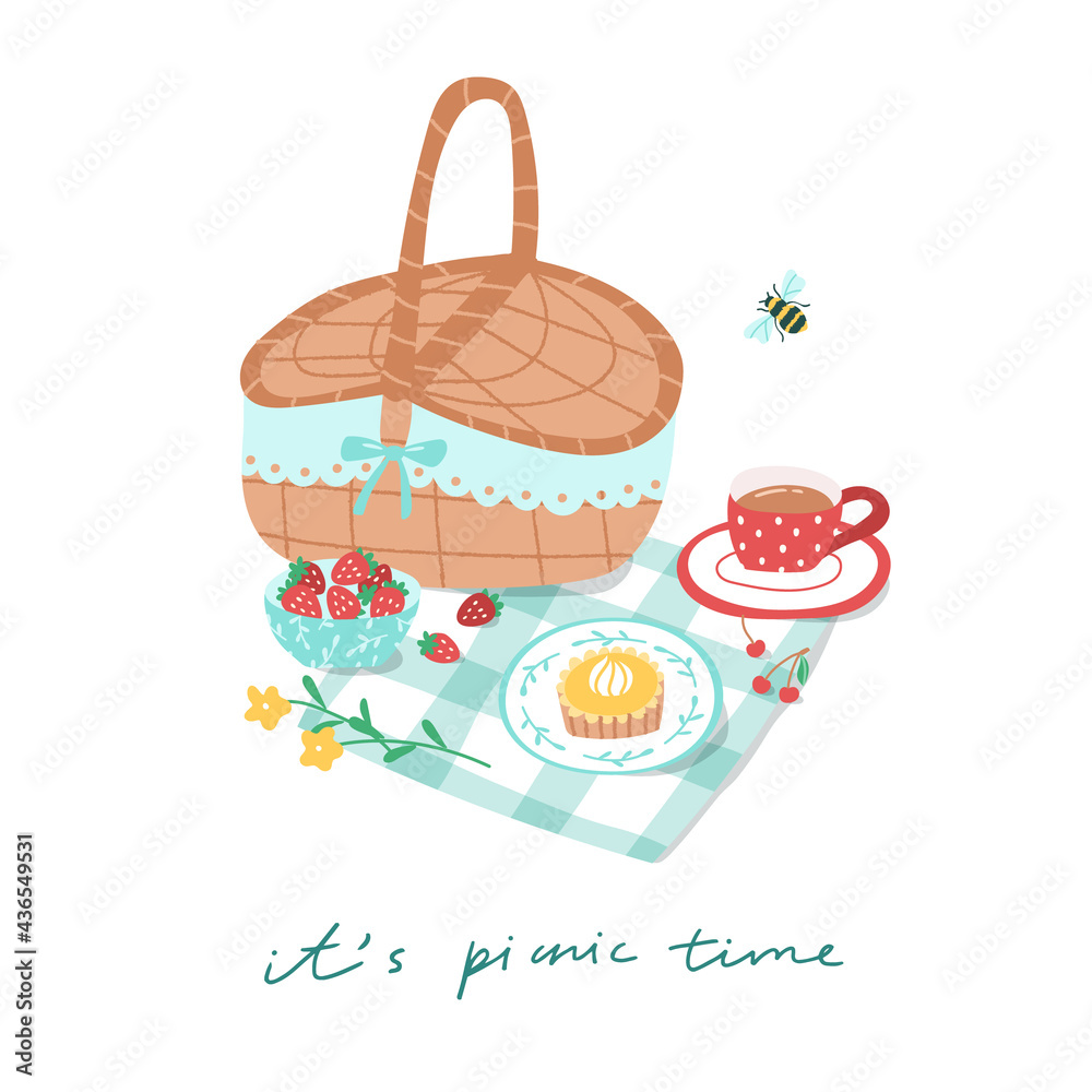 Cute picnic basket, tea cup and various desserts on a checkered towel