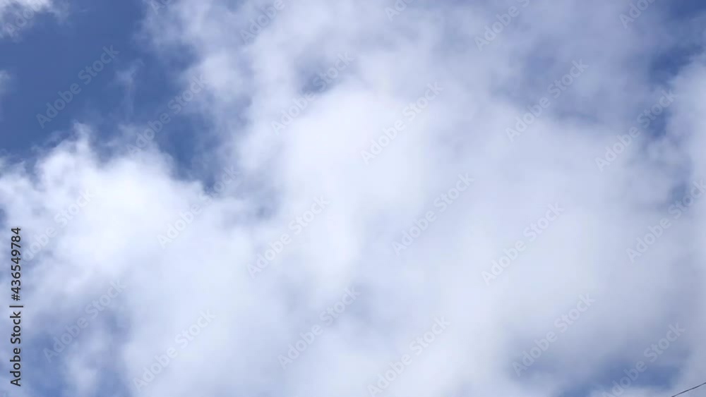 Time lapse HD video of fast clouds blowing through a blue sky.
Time lapse HD video of fast clouds blowing through a blue sky.