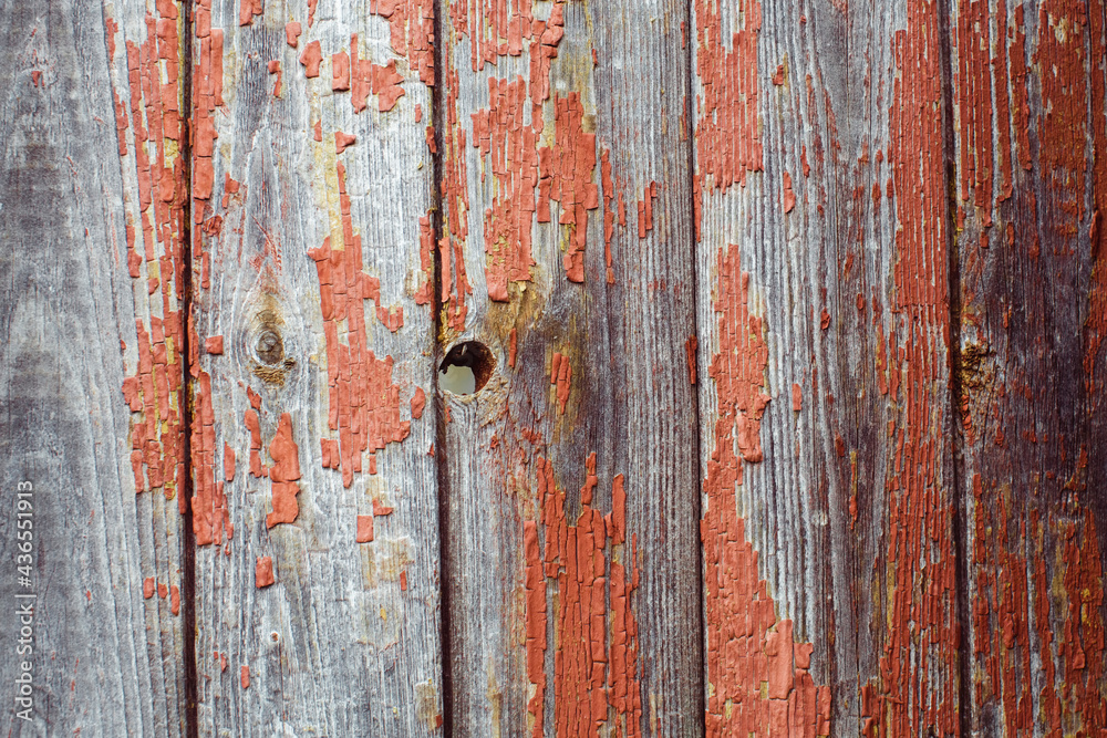 Texture of an old wooden vertical board with traces of paint. Texture of an old wooden vertical board with traces of paint.