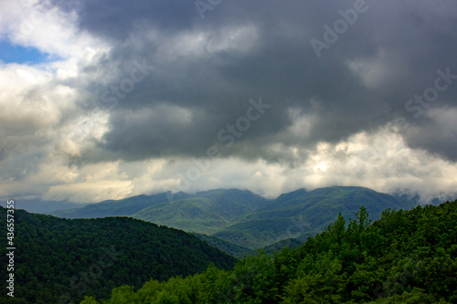 dark clouds over the mountains