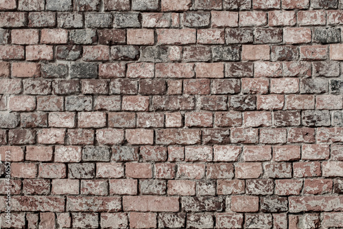 View brick wall texture background. Ancient wall with reddish bricks.