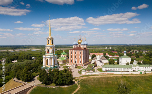View of architectural ensemble of Ryazan Kremlin with churches and cathedrals in sunny day, Russia.