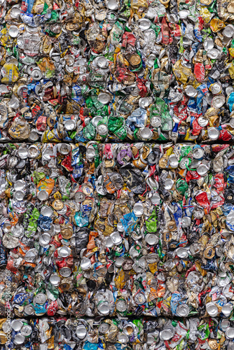 Moscow. Russia. October 2020. Aluminum cans are pressed into cubes. Tightly pressed aluminum beverage cans in a garbage factory after sorting
