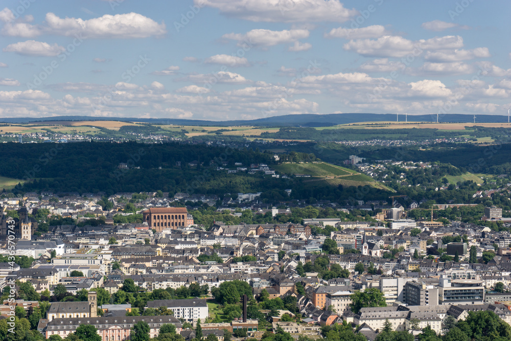 Aerial view of Trier on beautiful summer day with blue sky and clouds with Constantine Basilica, Germany