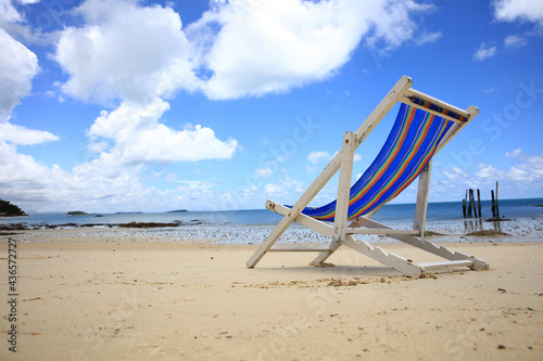 Close up beach chair with blue sky on sunny day , summer vacation and travel concept