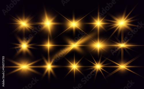 	
Set of gold bright beautiful stars. Light effect Bright Star. Beautiful light for illustration. Christmas star. White sparks sparkle with a special light. Vector sparkles on transparent background