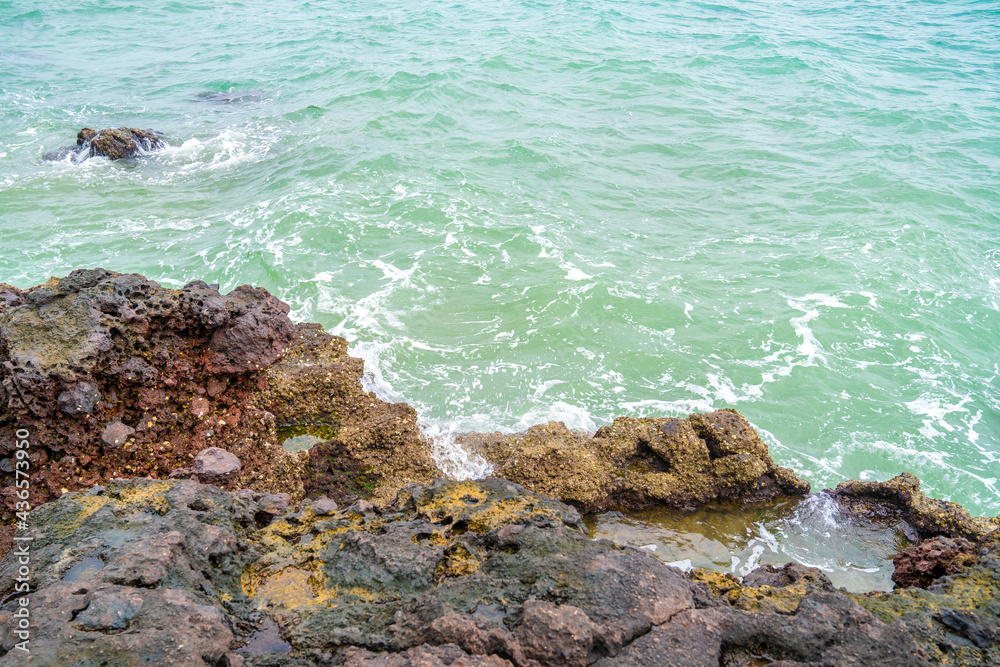The sea at the volcanic park Weizhou Island in Beihai, Guangxi, China The sea at the volcanic park Weizhou Island in Beihai, Guangxi, China
