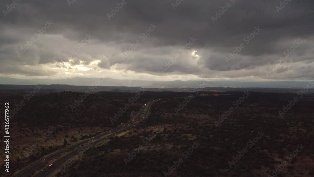 Aerial shot of storm rolling over the desert Aerial shot of storm rolling over the desert
