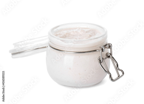 Jar with cashew sour cream on white background