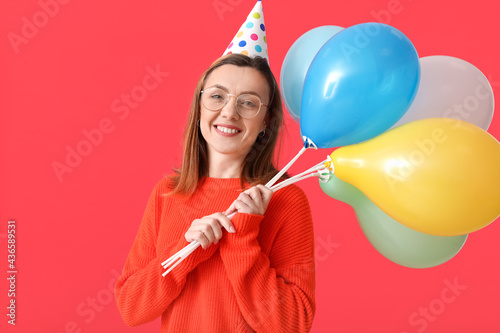 Beautiful woman with balloo...