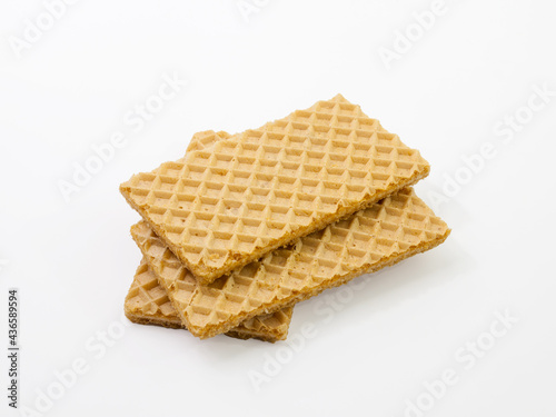 Stack of waffles isolated on white background.