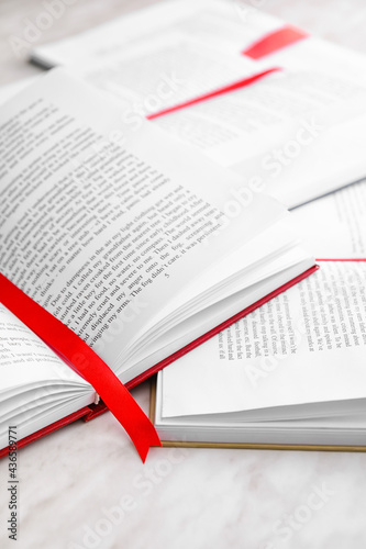 Open books with bookmarks o...