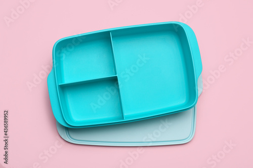 Empty school lunchbox on color background photo