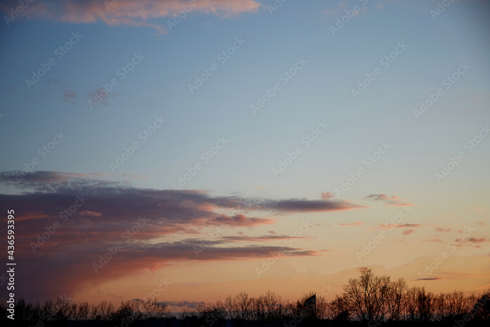 Blue hour - gorgeous sunset sky with pink twinkle clouds. Natural background. High quality photo