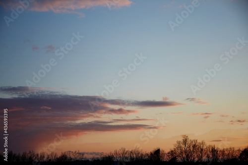 Fototapeta Naklejka Na Ścianę i Meble -  Blue hour - gorgeous sunset sky with pink twinkle clouds. Natural background. High quality photo