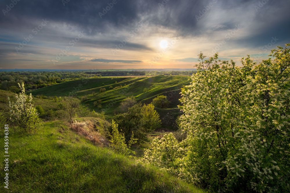 Obraz premium sunset over the hills