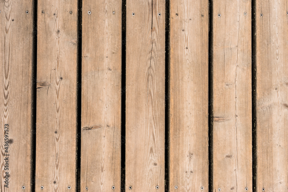 Obraz premium Old rustic light bright wooden texture. Close view of wooden plank table.