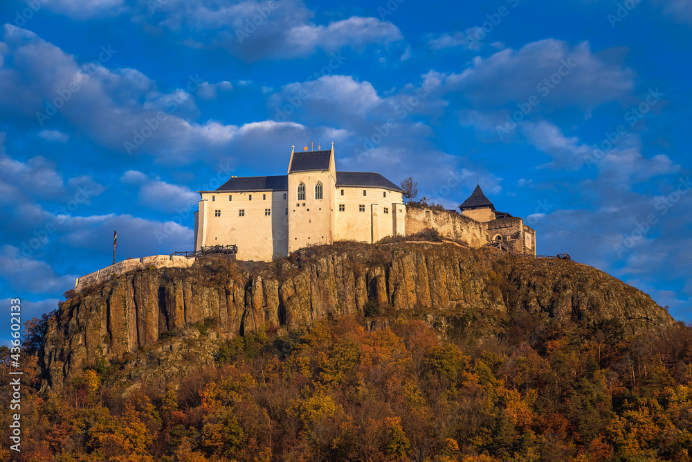 Fuzer, Hungary - The beautiful Castle of Fuzer with blue sky and clouds on an autumn morning. The castle has been located in the mountains of Zemplen