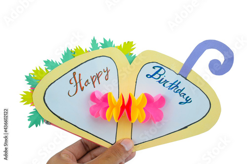 One birthday card made with small craft paper and nicely placed on a paper background