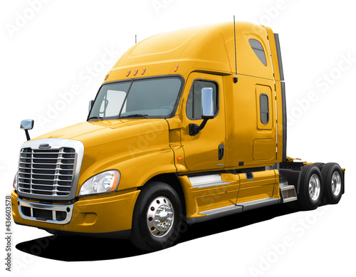 Large American modern tractor truck in full yellow color isolated on white background.