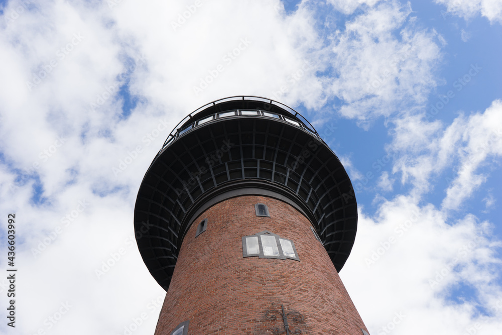 Old Water Tower with Clouds and Blue Sky in Svetlogorsk, Russia