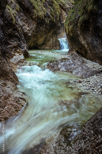 Beautiful narrow gorge with waterfall
