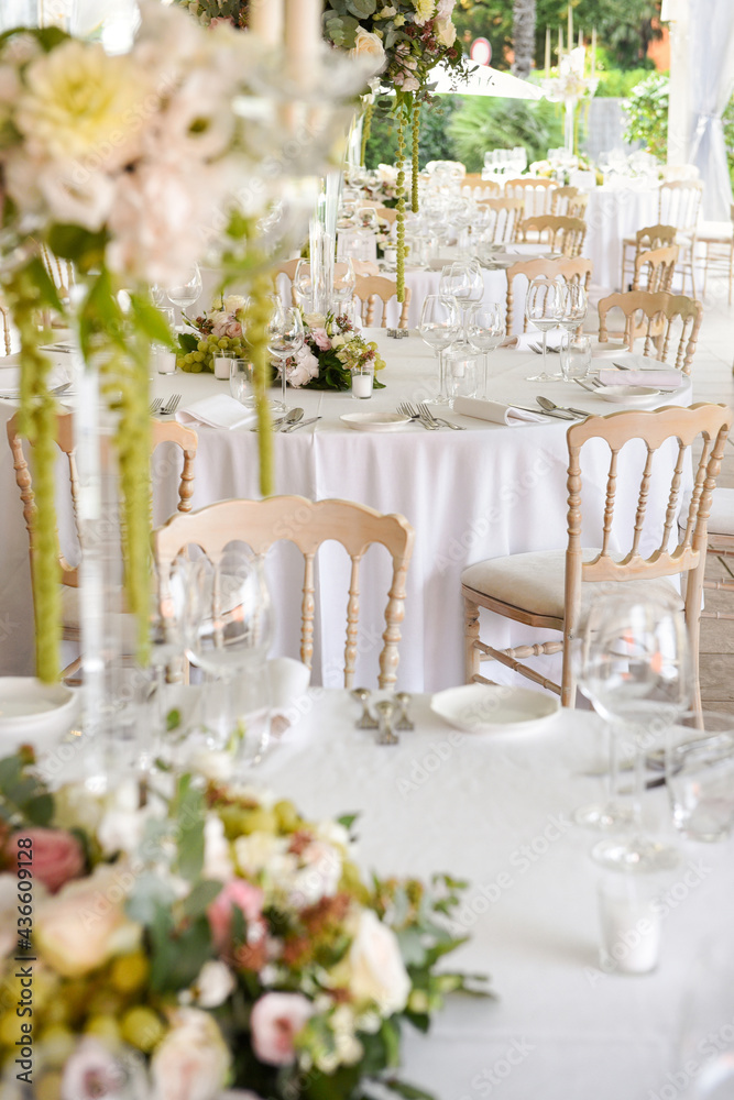 Wedding venue outdoors in a garden with stylish decor Wedding venue outdoors in a garden with stylish decor