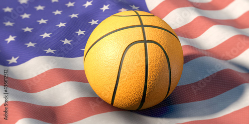 Basket ball lies on US flag