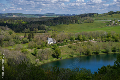 The view from above of the Weinfelder Maar and the Weinfelder Chapel