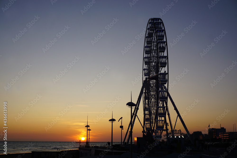 sunset on the Ferris wheel on the beach in Vendée, France sunset on the Ferris wheel on the beach in Vendée, France