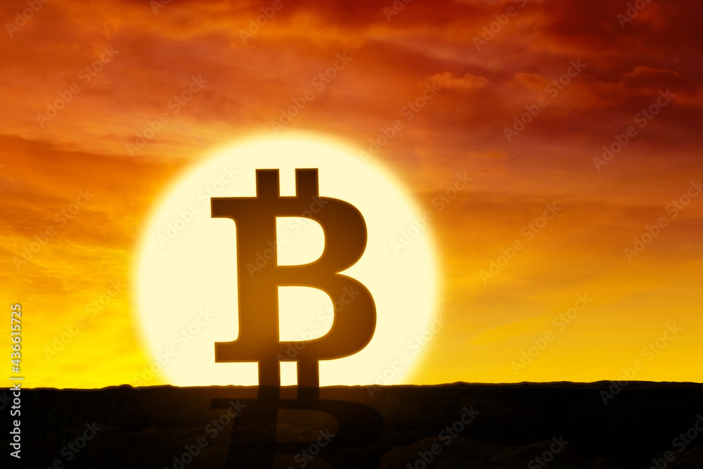 Fototapeta premium Bitcoin symbol with orange sky background
