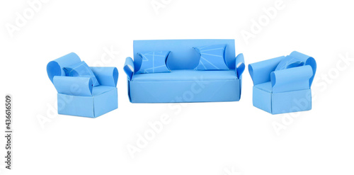 Three sofa made with small craft paper and nicely placed on a paper background