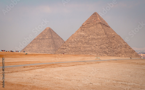 Closeup panorama of the pyramids in Giza  Egypt on a foggy day