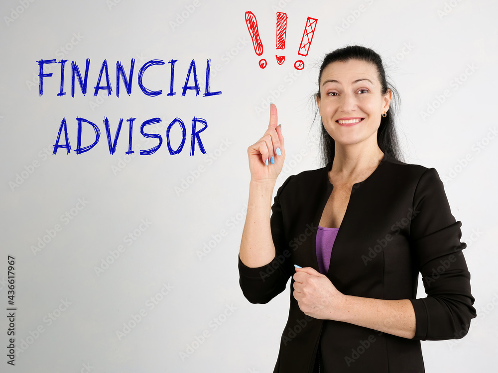 FINANCIAL ADVISOR exclamation marks phrase on the gray wall FINANCIAL ADVISOR exclamation marks phrase on the gray wall