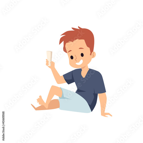 Smiling child on the floor with mobile phone, flat vector illustration isolated.