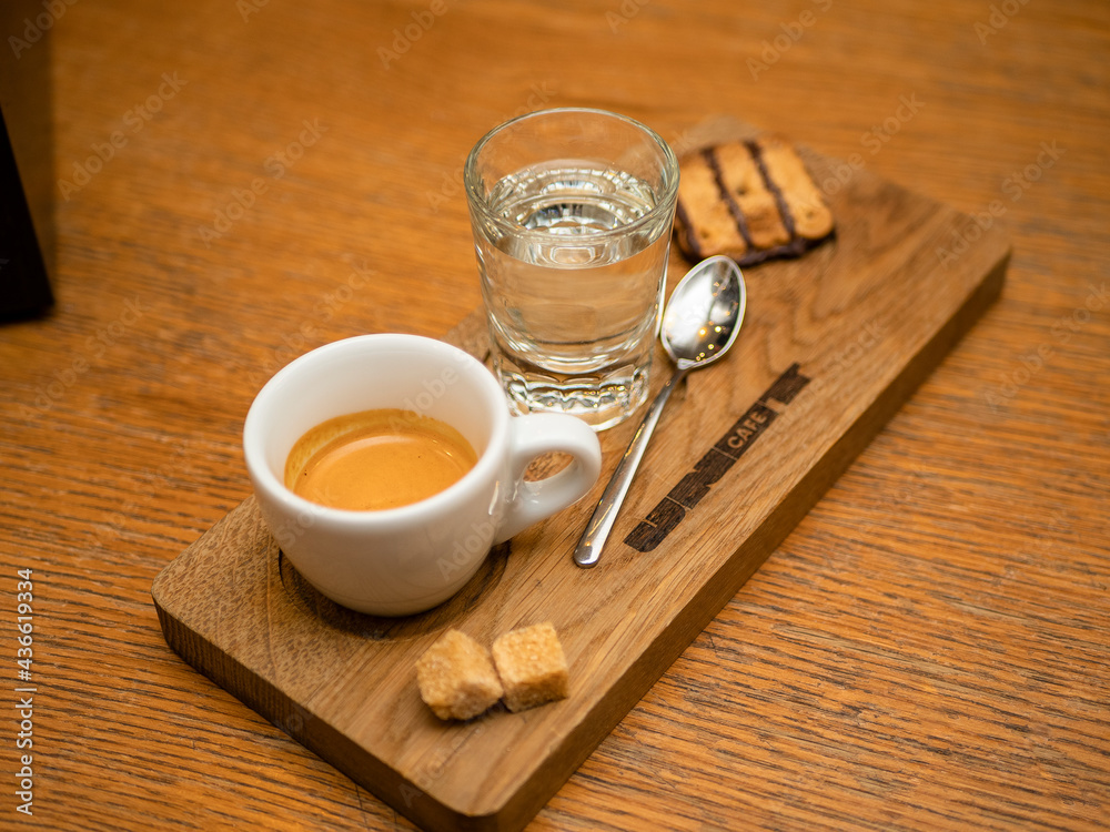 Obraz premium espresso with water and biscuits