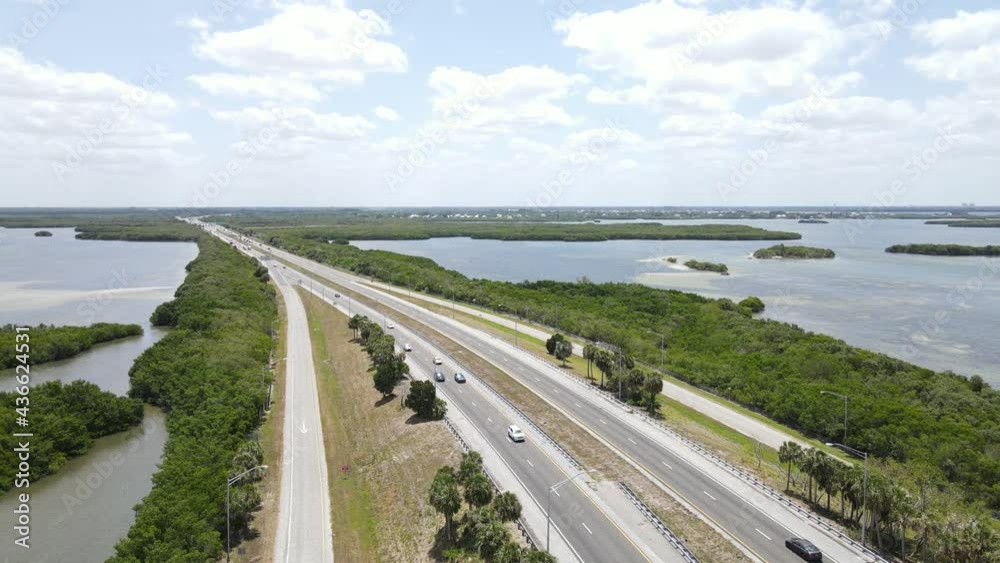 circular aerial of the mangrove islands surrounding the Sunshine Skyway tollway road that crosses Tampa Bay circular aerial of the mangrove islands surrounding the Sunshine Skyway tollway road that crosses Tampa Bay