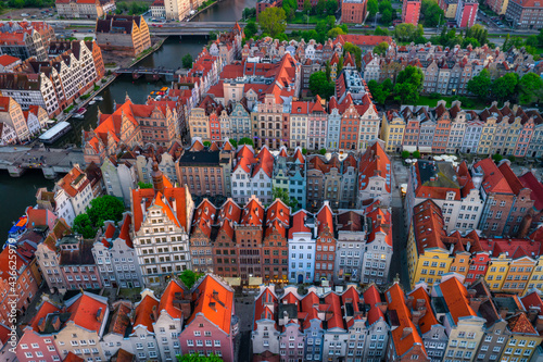 Amazing architecture of the main city in Gdansk at sunset, Poland. Aerial rooftop scenery.