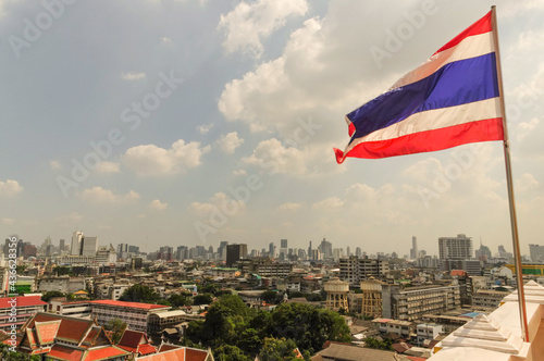 Photography Beautiful view of the capital city Bangkok and the flag of Thailand under a clou